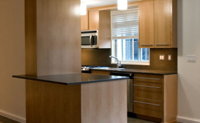 view of kitchen in apartment interior design architecture project for developers in NYC by Gran Kriegel Architects